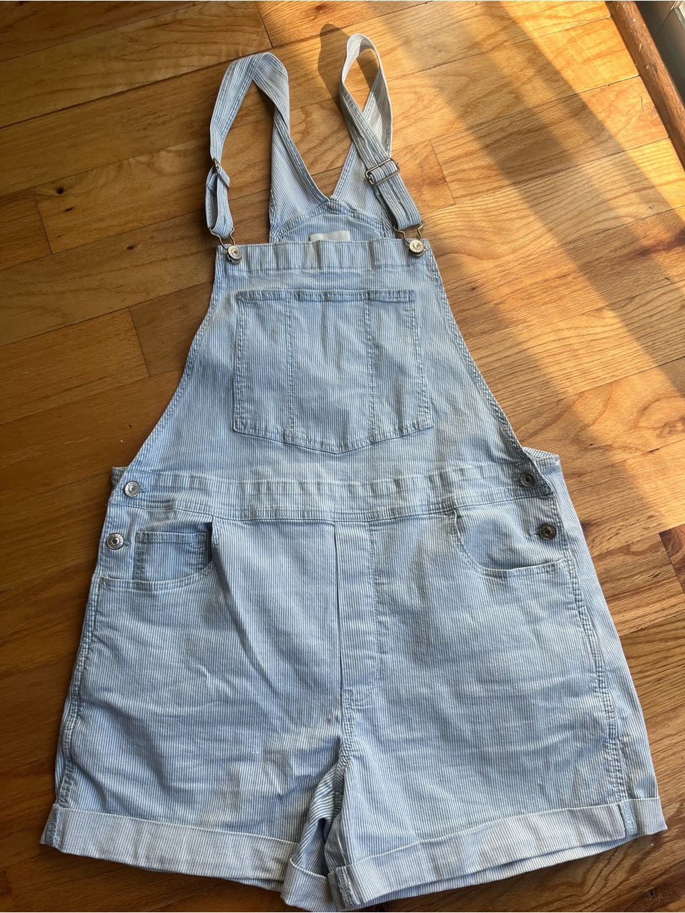 American Eagle blue and white striped overall shorts